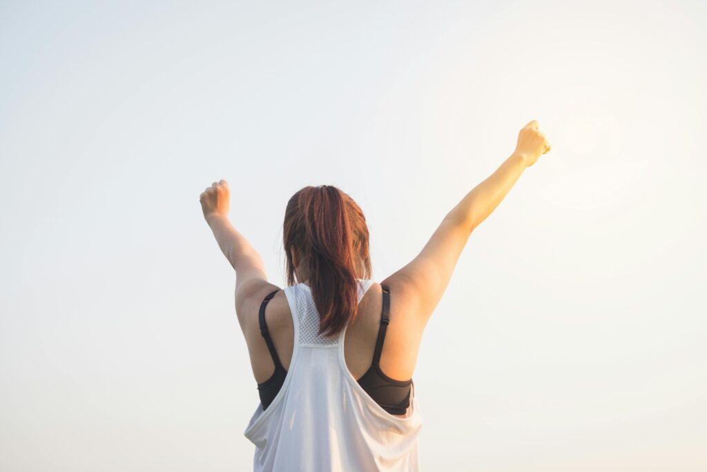 Person Celebrating Cambridge Osteopaths - Spritely Osteopathy